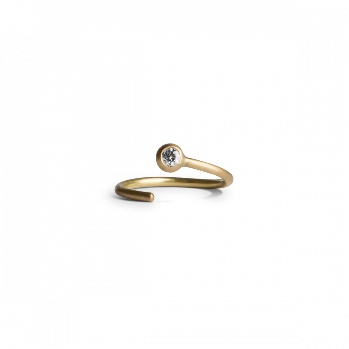 Vridørering i 14 karat guld med 1 x 0.02ct. brill.